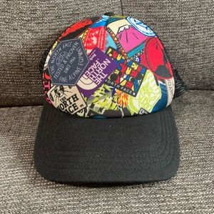 The North Face multi logo snap back cap/hat. One size. Excellent condition.
